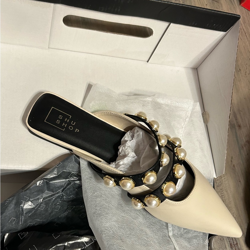 Never worn slide in flats from ShuShop. Color ivory.